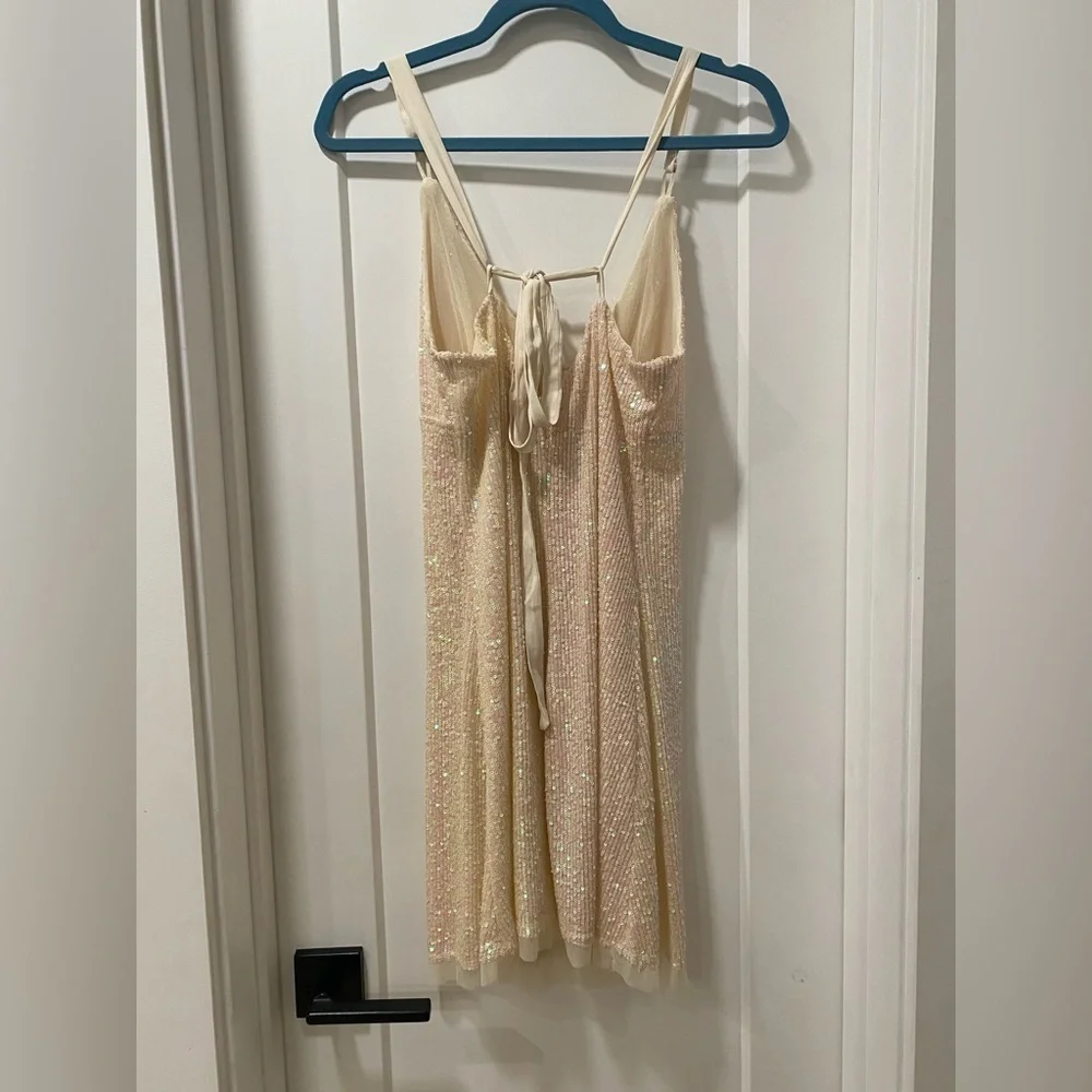 Free People Gold Rush Mini Dress in Icicle Pearl Combo. Perfect for Coachella